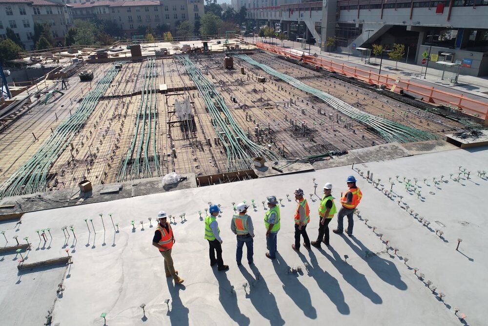 Industrial development site with the crew on it