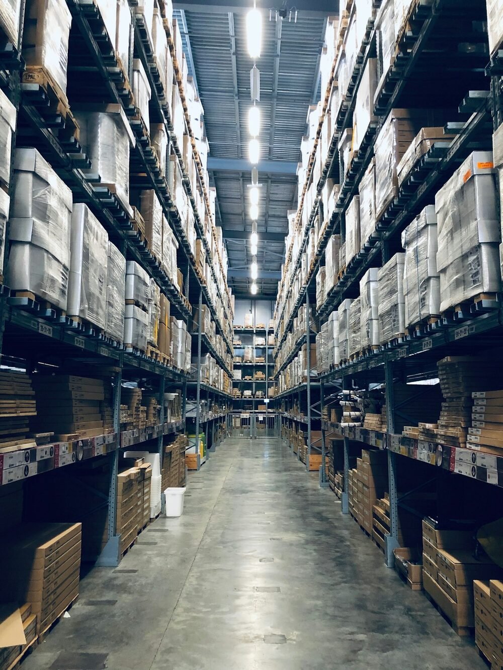 A racked warehouse aisle — representative of this asset class, not a photograph of this property